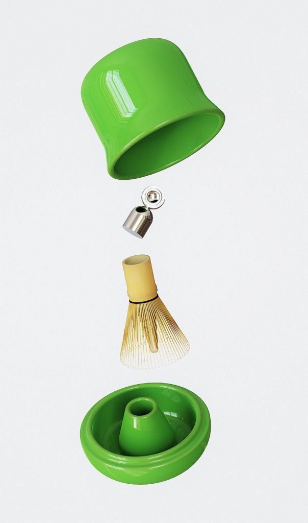Green ceramic matcha kit shown exploded, revealing whisk, scoop, and holder inside.