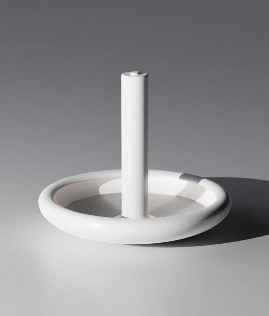 White glossy minimal object. Beacon Portable Table Lamp by All Design Lab.