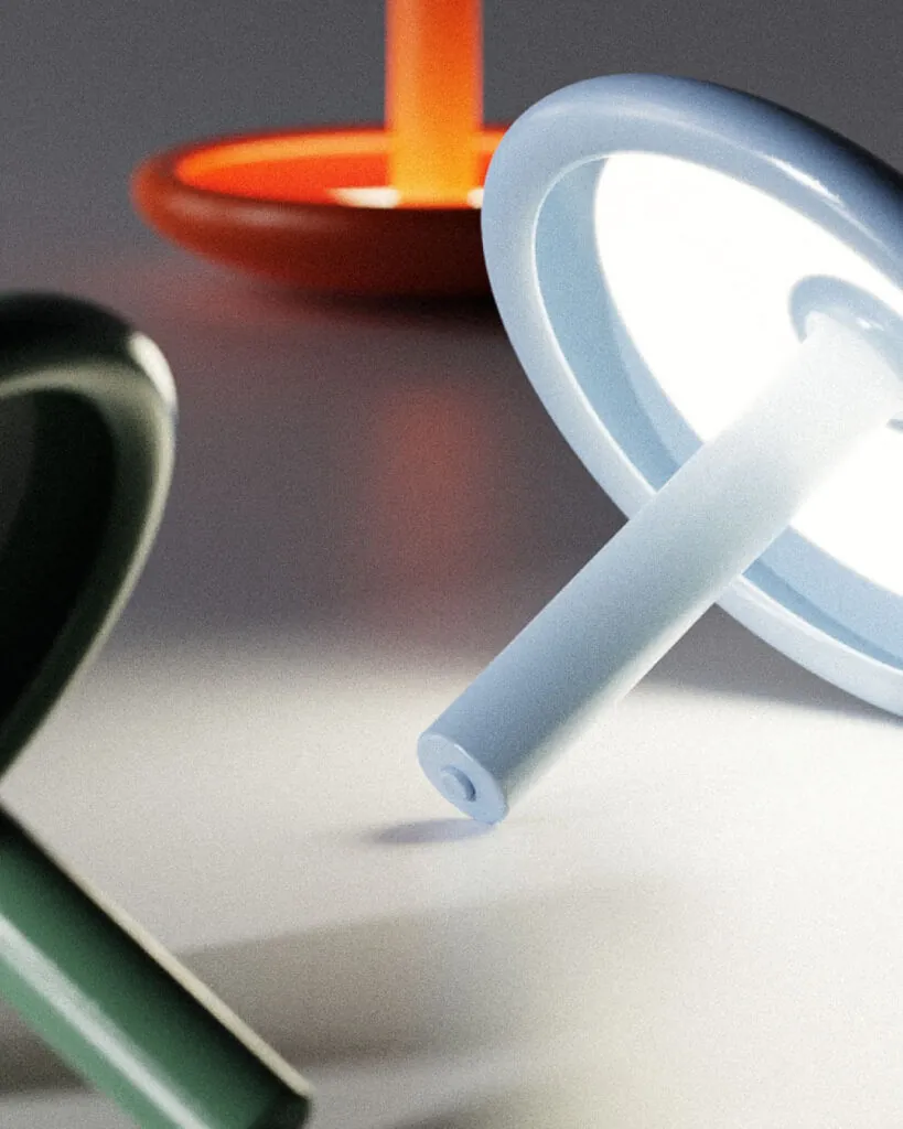Close up of different colored minimal objects with light. Beacon Portable Table Lamp by All Design Lab.